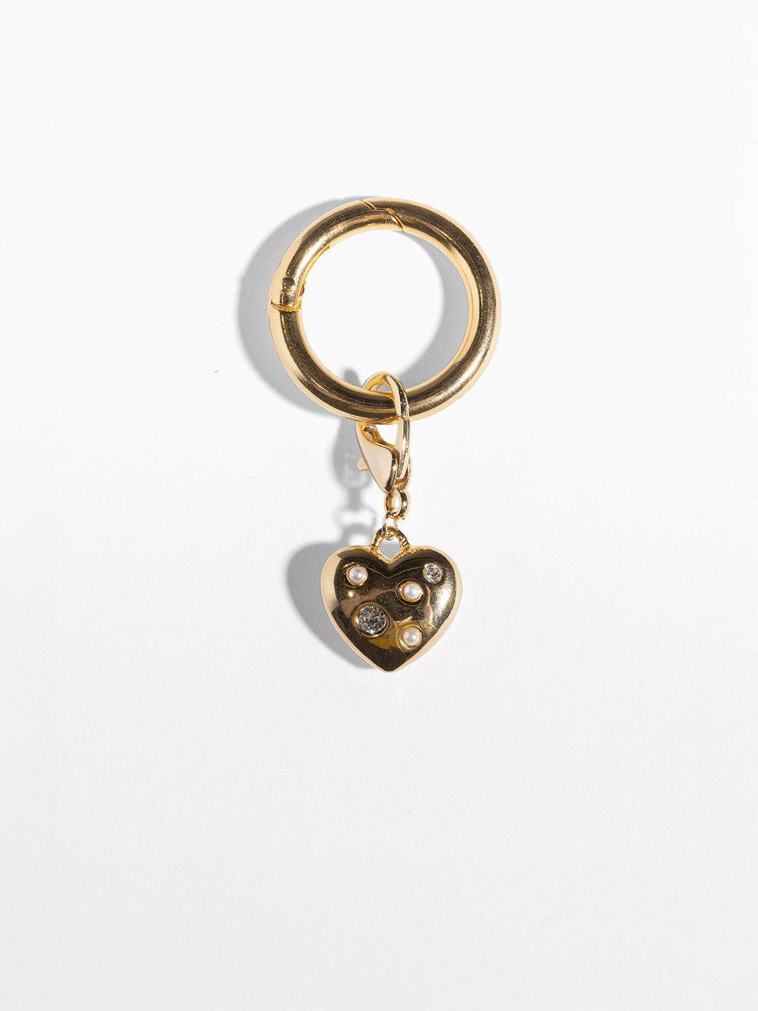 tiny heart charm in Gold