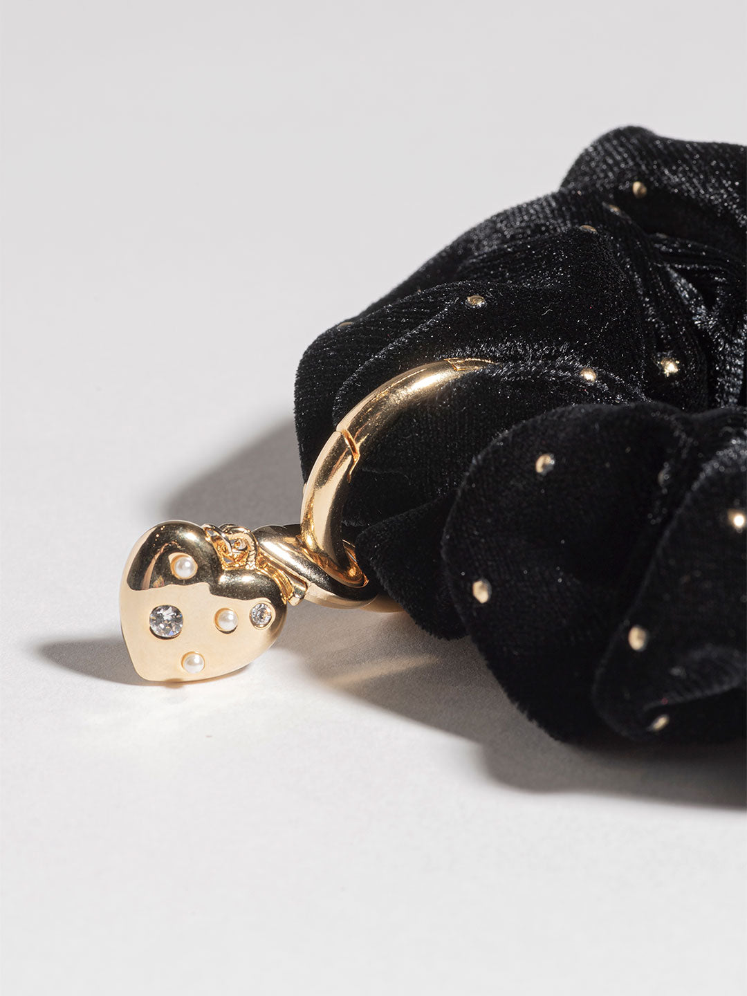 tiny heart charm in Gold